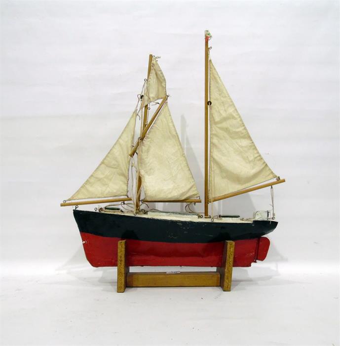 Wooden painted two-masted pond yacht, 53cm long