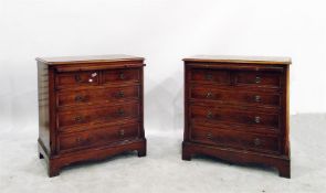 Pair of reproduction yew veneered chests of two sh