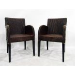 Set of four Lloyd Loom style elbow chairs (4)