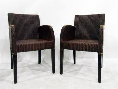 Set of four Lloyd Loom style elbow chairs (4)