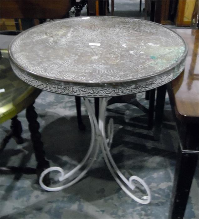 Indian brass topped circular table on wrought iron