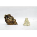 Small carved ivory model of Buddha and a soapstone
