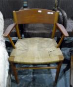 Teak framed string seated elbow chair