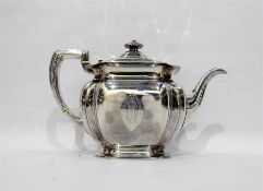 Silver teapot of rectangular bulbous fluted form,