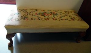 Rectangular fender stool with upholstered floral e
