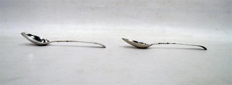 Matched pair of Georgian silver tablespoons, one L