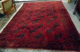 Persian wool rug, dark red ground with black eleph