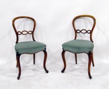 Pair of Victorian balloon back dining chairs with