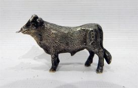 A silver model bull, date marks worn, makers SMD (