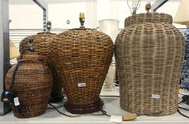 Four various cane wickerwork table lamps, various