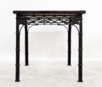 Rosewood table on a chinese chippendale style meta
