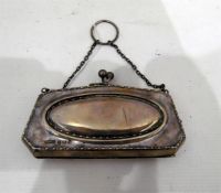 Lady's silver evening purse with chased floral dec