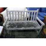 Slatted wooden garden bench seat