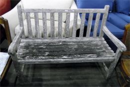 Slatted wooden garden bench seat