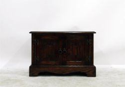 Reproduction oak television stand enclosed by line