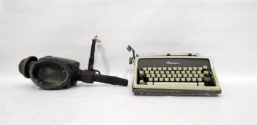 Olympic typewriter and old carriage lamp