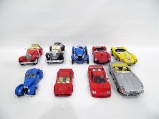 Quantity of Burago vintage model racing cars, etc