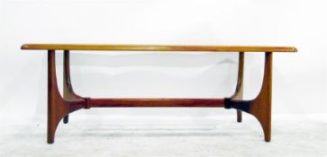 Glass-topped stained wood coffee table