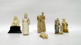 Carved ivory figures including western style coupl