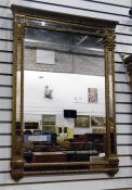 Regency multi-panelled wall mirror in ornate gilt