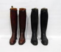 Two pairs of leather hunting boots, one pair brown