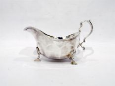 Georgian style silver gravy boat with reeded borde