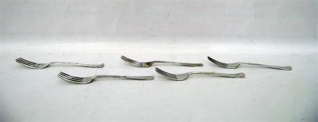 Five Georgian silver dinner forks, varying dates a