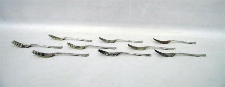 Nine Old English feather-edged silver dessert fork