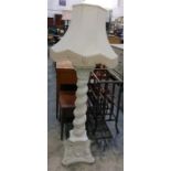 Painted wood lamp standard, elaborately carved wit