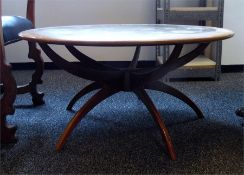 Contemporary circular-top coffee table, the top wi