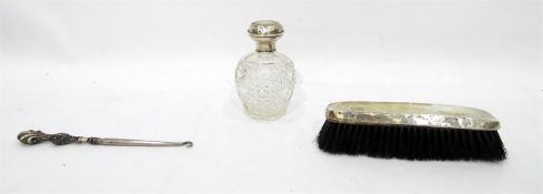 Silver-topped cut glass scent bottle, floral swag
