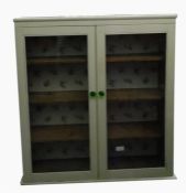 Cream painted bookcase with four shelves, glazed d