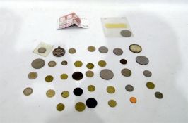 Small quantity of coins and banknotes in bag