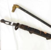Sword (damaged) and a walking stick with dog's head (2)