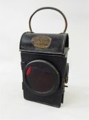 Railway hand lamp, SNLW Limited, plated GR 1941 with red lens and internal burner, 26cm high over