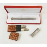 Cartier white metal pencil, cased, a Georgian mother-of-pearl and silver folding knife and fork with