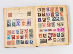 Two albums and two envelopes of stamps including worldwide with one or two good stamps noted