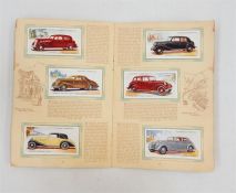 Quantity of cigarette cards to include Players 'Album of Motor Cars', Wills 'Album of Dogs', John