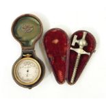J B Winter, Newcastle on Tyne pocket barometer in case and a winder in case (2)