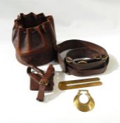 Sam Brown belt with brass attachments, in a brown leather draw-string bag