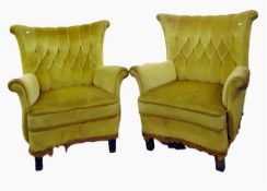 Pair of easy chairs in a dralon-type gold-coloured upholstery, with buttoned scroll shaped backs