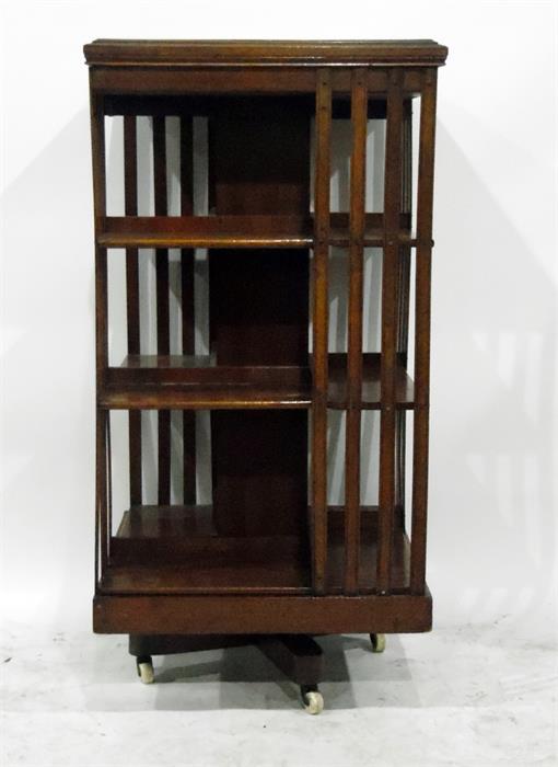 Early 20th century oak revolving bookcase, 117cm high