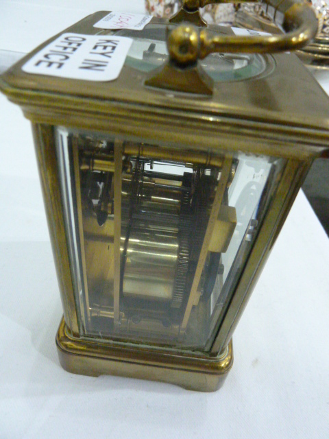 Brass carriage clock in corniche case, with striking movement, 18cm high over the handle - Image 7 of 7