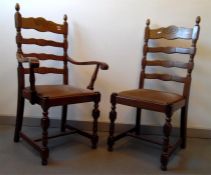 Set of four oak ladderback dining chairs with upholstered seats, on turned legs with stretchers (4)