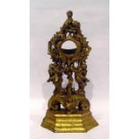 Early 19th century giltwood pocket watch stand with rococo style decoration with scrolls and