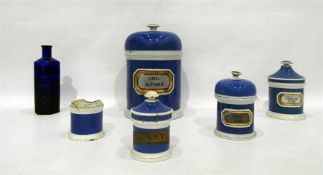 Five various ceramic pharmaceutical jars and a blu