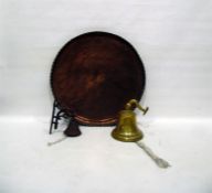 Large copper plate/table top, a brass ship's style bell and another wall-mounted bell (3)