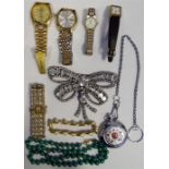 Quantity of costume jewellery to include brooches, wristwatches, bracelets, etc (1 box)