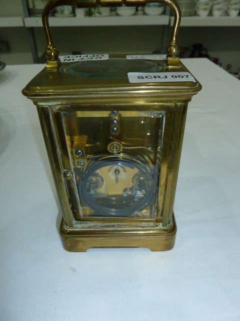 Brass carriage clock in corniche case, with striking movement, 18cm high over the handle - Image 3 of 7