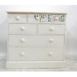 White painted pine chest of five short and two long drawers, with turned wooden knob handles, raised